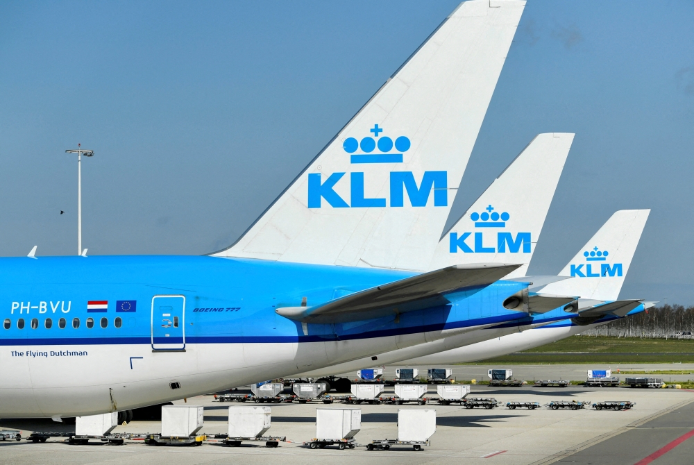 KLM airplanes are seen parked at Schiphol Airport in Amsterdam, Netherlands April 2, 2020. REUTERS/Piroschka van de Wouw/File Photo