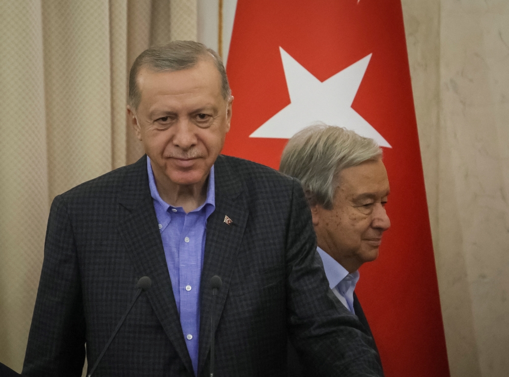 Turkish President Tayyip Erdogan and UN Secretary-General Antonio Guterres arrive for a joint news conference with Ukrainian President Volodymyr Zelenskiy following their meeting in Lviv, Ukraine, August 18, 2022. (REUTERS/Gleb Garanich)