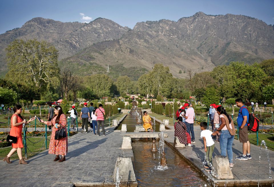 Tourists visit Nishat Garden in Srinagar, April 5, 2022. REUTERS/Danish Ismail


