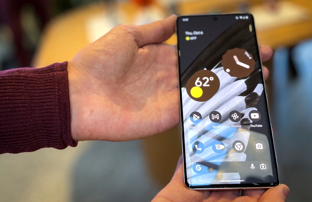The new Google Pixel 7 Pro smartphone is held at a launch event for new Google hardware devices in the Brooklyn borough of New York City, New York, U.S., October 6, 2022. REUTERS/Roselle Chen