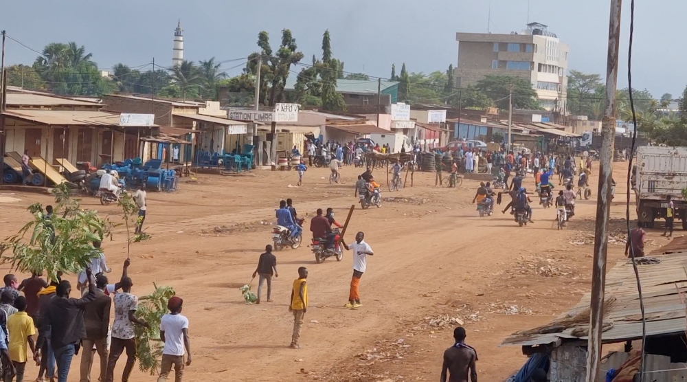 People ride bikes as they protest in Moundou, Chad, on October 20, 2022 in this picture obtained from social media. Hyacinthe Ndolenodji/via REUTERS 