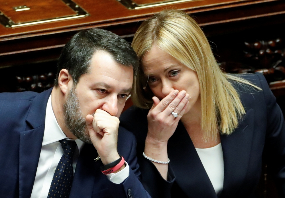 Italy's Prime Minister Giorgia Meloni and Deputy Prime Minister and Infrastructure Minister Matteo Salvini attend the lower house of parliament ahead of a confidence vote for the new government, in Rome, Italy, on October 25, 2022. REUTERS/Remo Casilli