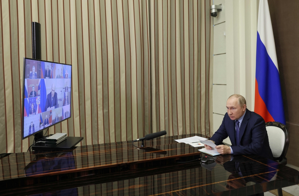 Russian President Vladimir Putin chairs a meeting of the coordination council to meet the needs of Russia's Armed Forces via a video link in Sochi on November 2, 2022. (Alexei Babushkin / AFP)
