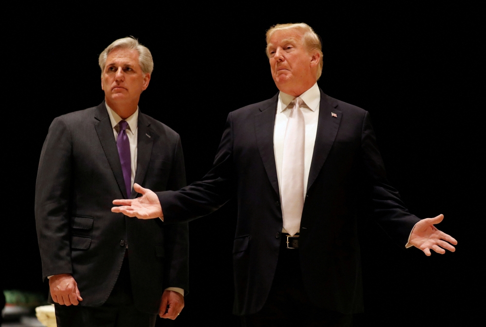US President Donald Trump speaks as he and House Majority Leader Kevin McCarthy arrive for dinner at Trump's golf club in West Palm Beach, Florida, US, on January 14, 2018. File Photo / Reuters