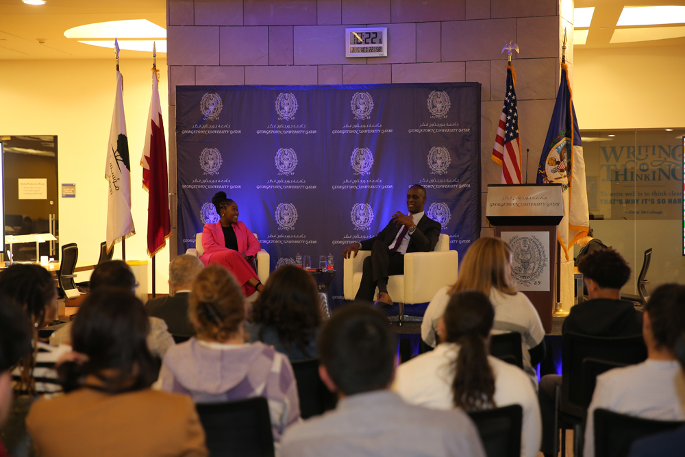 US Ambassador to  Qatar H E Timmy T Davis (right) and Co-president of the Black Students Association and moderator Michelle Siyabonga Hadebe during the event. 