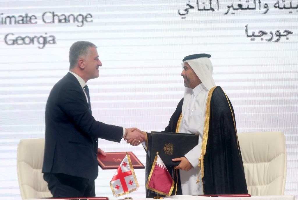 Minister of Environment and Climate Change H E Sheikh Dr. Faleh bin Nasser bin Ahmed bin Ali Al Thani and Minister of Environmental Protection and Agriculture of Georgia H E Otar Shamugia exchanging documents after signing the agreement.