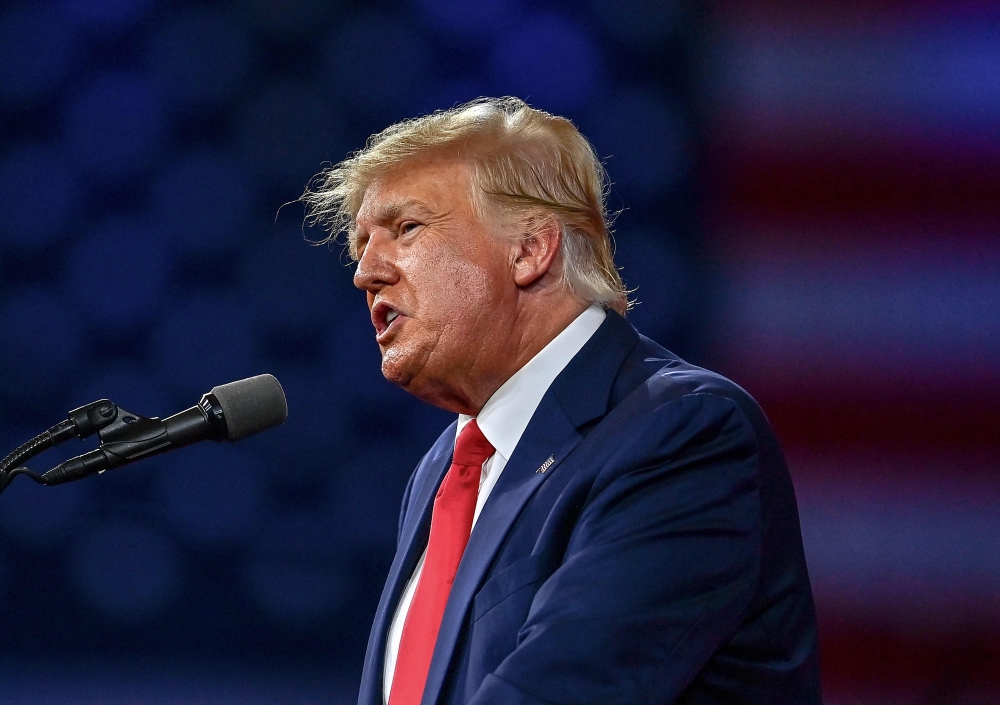 In this file photo taken on February 26, 2022, former US President Donald Trump speaks at the Conservative Political Action Conference 2022 (CPAC) in Orlando, Florida.  (Photo by CHANDAN KHANNA / AFP)