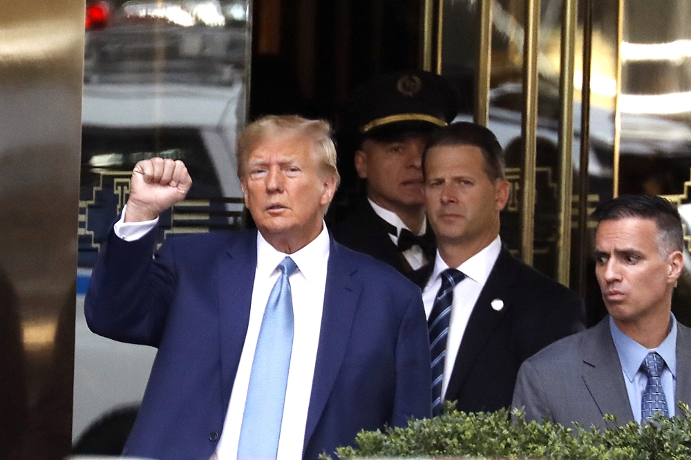 Former US President Donald Trump leaves Trump Tower on April 13, 2023 in New York City. Trump is scheduled to be deposed for a civil lawsuit brought by New York Attorney General Letitia James over allegations that the Trump Organization falsified financial statements in order to obtain loans. (Photo by John Lamparski/Getty Images/AFP) 