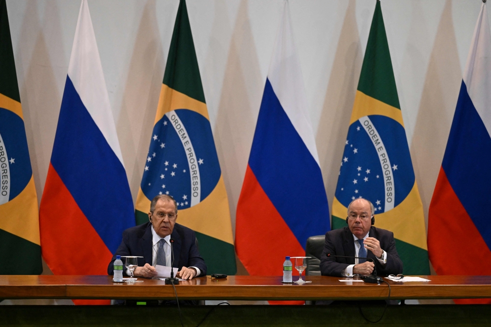 Russian Foreign Minister Sergey Lavrov (left) speaks during a joint press conference with his Brazilian counterpart Mauro Vieira (R) at Itamaraty Palace in Brasilia on April 17, 2023. (Photo by EVARISTO SA / AFP)