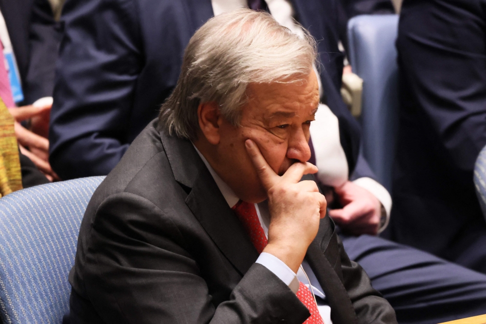 U.N. Secretary-General Antَnio Guterres listens as Russian Foreign Minister and Security Council Acting President for the month of April Sergey Lavrov speaks during a Security Council meeting at the United Nations headquarters on April 24, 2023 in New York City. (Photo by Michael M. Santiago / GETTY IMAGES NORTH AMERICA / Getty Images via AFP)
