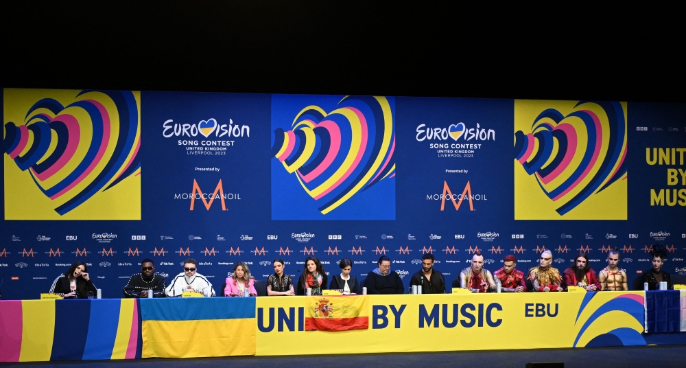 (L-R) Singer and songwriter Mae Muller, Music duo Tvorchi, Singer Blanca Paloma, Singer Marco Mengoni, Metal band Lord Of The Lost and Singer and songwriter La Zarra attend a a press conference on the eve of the final of the Eurovision Song contest 2023 at the M&S Bank Arena in Liverpool, northern England on May 12, 2023. (Photo by Paul Ellis / AFP)