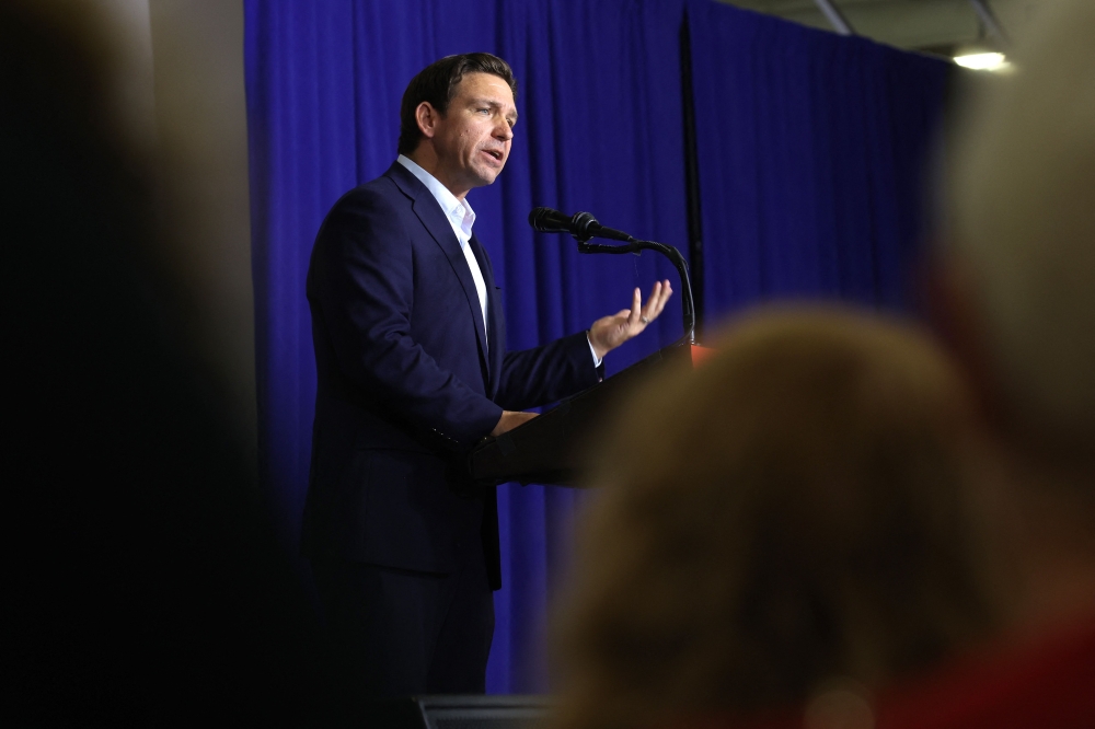 Republican presidential candidate Florida Governor Ron DeSantis Speaks to guests at Ashley's BBQ Bash hosted by Congresswoman Ashley Hinson (R-IA) on August 06, 2023 in Cedar Rapids, Iowa. Seven of the 14 GOP candidates seeking the party's nomination for president were scheduled to speak at the event. (Photo by SCOTT OLSON / GETTY IMAGES NORTH AMERICA / Getty Images via AFP)
