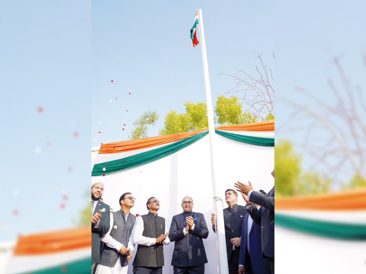 Ambassador of India to Qatar H E Vipul (centre) with other officials during the flag hoisting at the ICC yesterday.