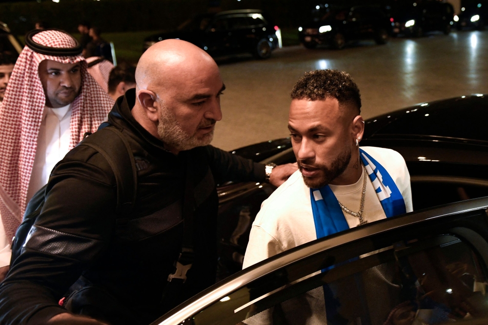 Brazilian forward Neymar arrives to Riyadh on August 18, 2023 after signing for Al-Hilal on a two-year contract. (Photo by AFP)
