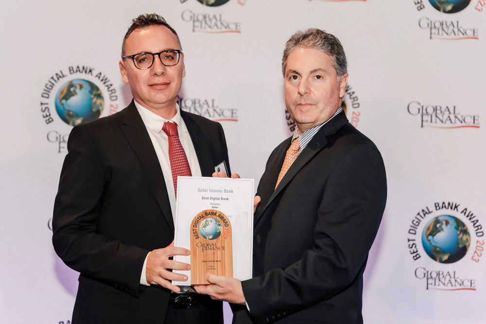 QIB’s Chief Strategy & Digital Officer Constantinos Constantinides (left) receives awards at Global Finance’s 2023 World’s Best Digital Bank Awards ceremony.