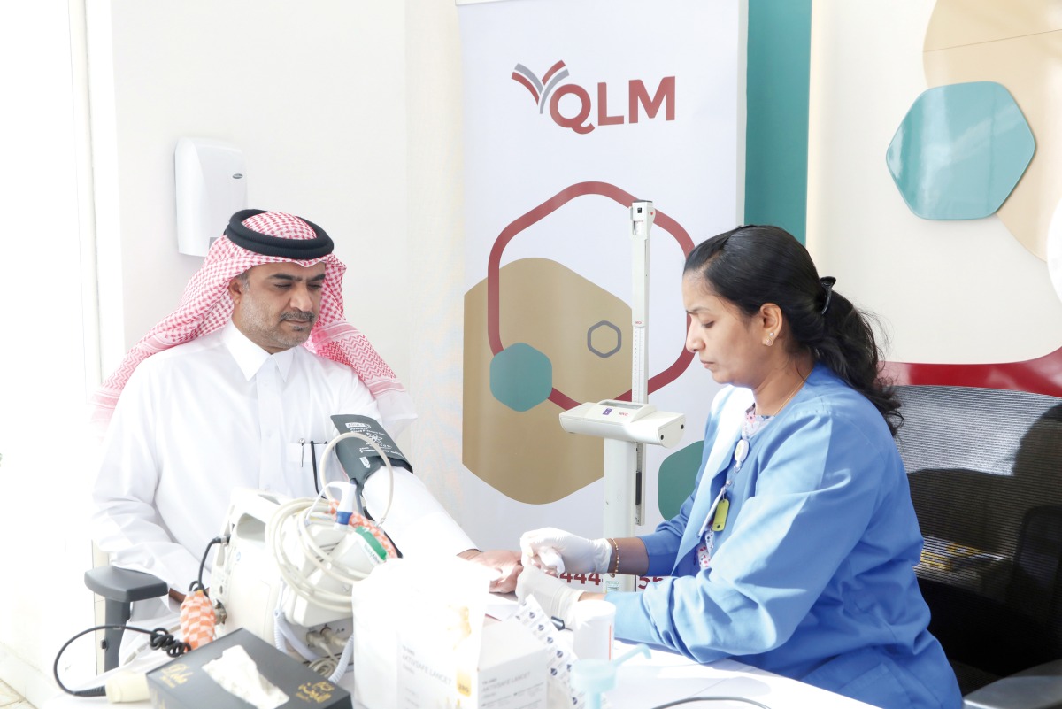 A donor donating blood at QLM Life & Medical Insurance Company headquarters.