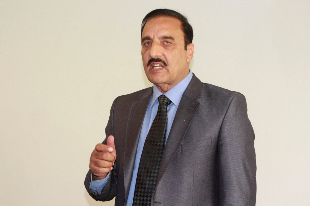 Rawalpindi Commissioner Liaquat Ali Chattha speaks at a press conference in Rawalpindi on February 17, 2024. (Photo by Ghulam Rasool / AFP)