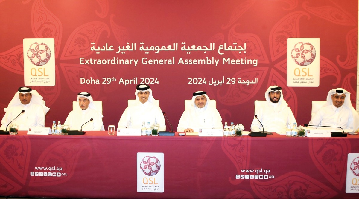 QSL President Jassim bin Rashid Al Buenain (third left) and CEO Hani Taleb Ballan (third right) during the Extraordinary General Assembly Meeting yesterday. QSL  