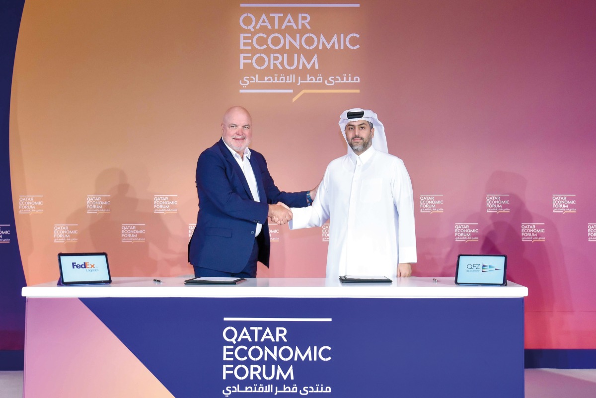 Sheikh Mohammed H F Al Thani, CEO of Qatar Free Zones Authority, and Patrick Moebel, President and CEO of FedEx Logistics, during the signing ceremony.