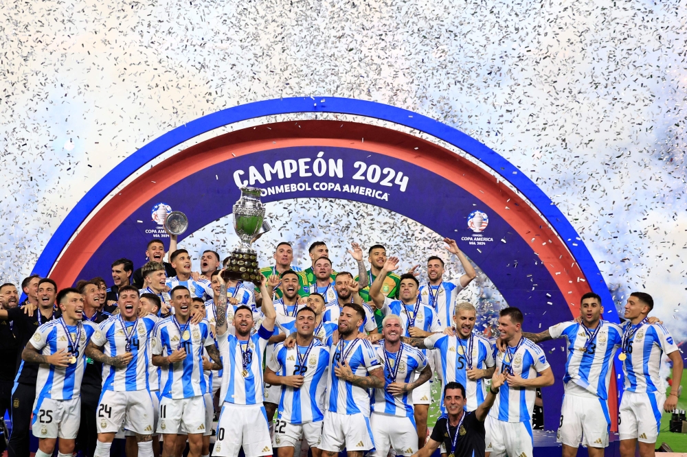 Lionel Messi of Argentina celebrates with the trophy after the team's victory in the CONMEBOL Copa America 2024 Final. Buda Mendes/Getty Images/AFP 