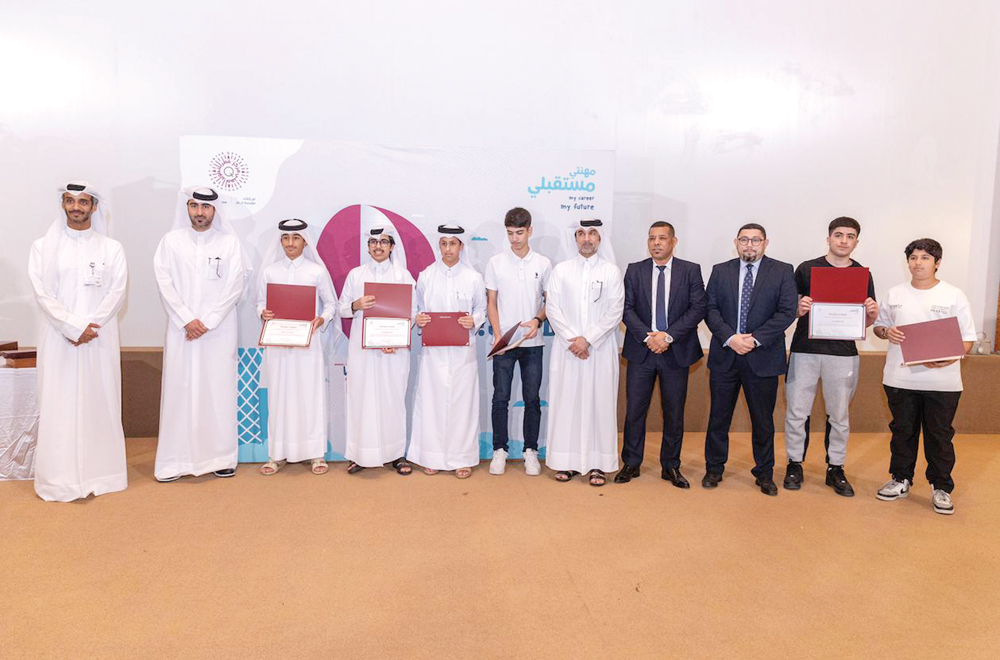Officials with some of the participants at the conclusion ceremony of the programme.