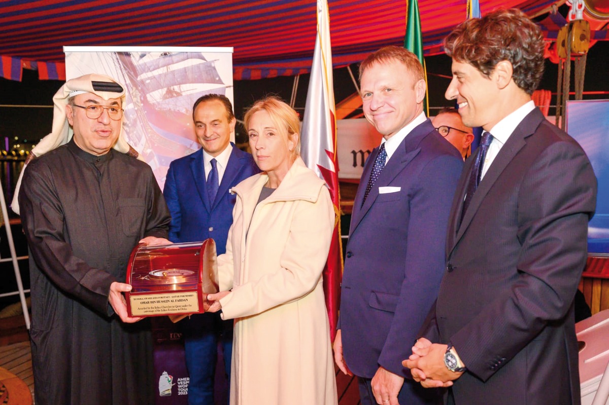 President of Italian Chamber of Commerce in Qatar Palma Libotte presenting the award to President and CEO of Alfardan Group, Omar bin Hussain Alfardan. Italy’s Minister of Agriculture, Food Sovereignty and Forestry H E Francesco Lollobrigida (second right) and Ambassador of Italy to Qatar H E Paolo Toschi (first right) are also seen. 