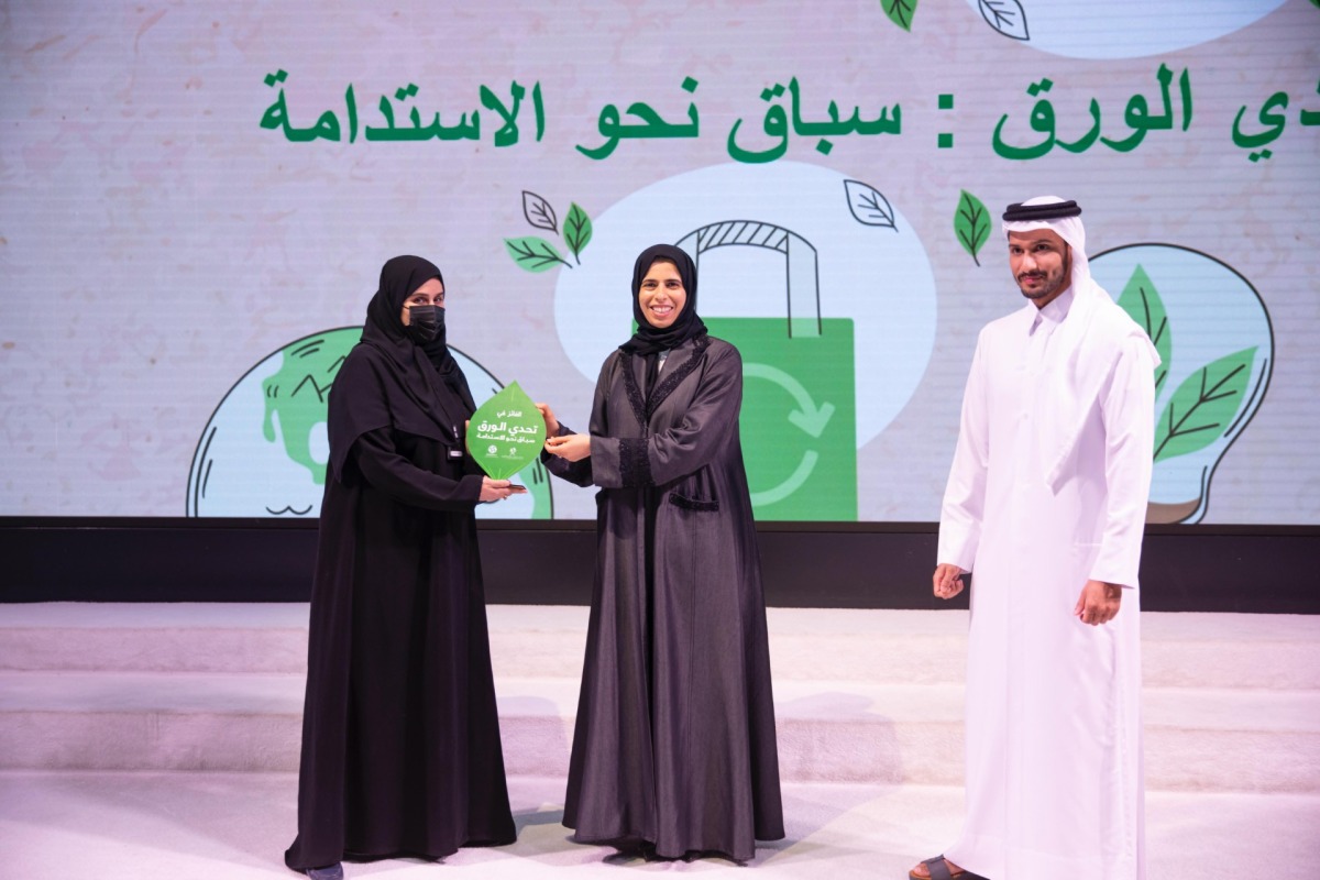 Minister of Education and Higher Education H E Lolwah bint Rashid Al Khater honouring a winner. 