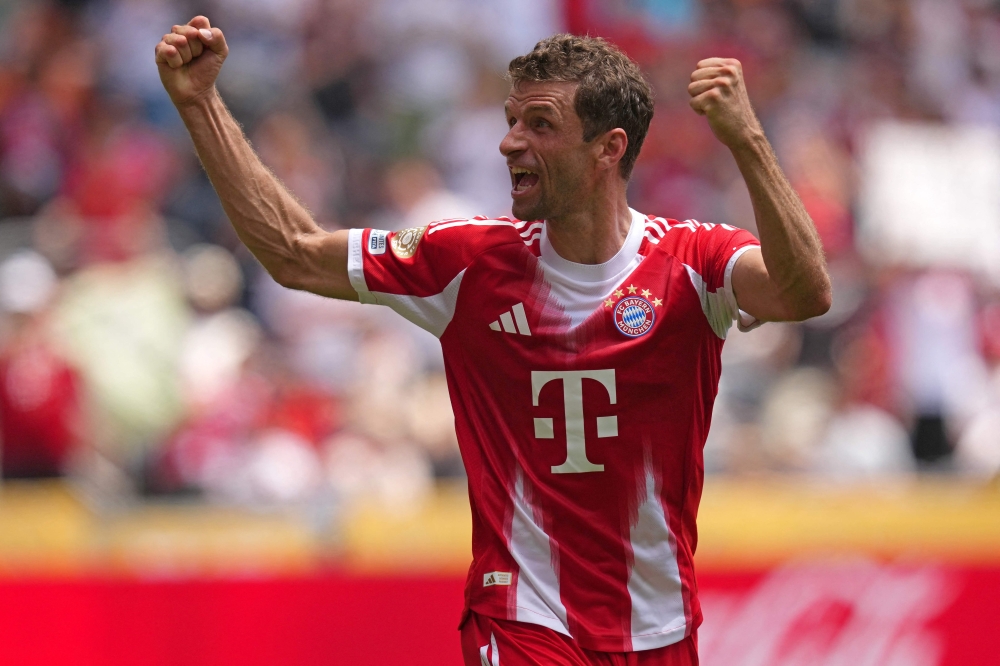 Thomas Mueller #25 of FC Bayern Munchen celebrates scoring his team's tenth goal during the FIFA Club World Cup 2025 group C match between FC Bayern München and Auckland City FC at TQL Stadium on June 15, 2025 in Cincinnati, Ohio. (Photo by Dylan Buell/Getty Images via AFP)