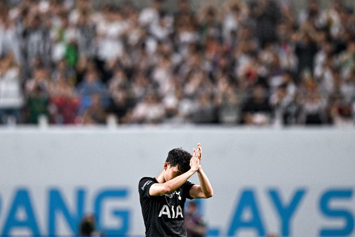 Tottenham Hotspur's captain Son Heung-min reacts as he leaves the field after being substituted during a friendly football match between Tottenham Hotspur and Newcastle United in Seoul on August 3, 2025. (Photo by Anthony WALLACE / AFP)
