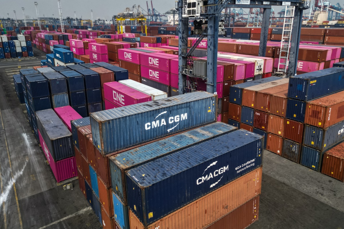 Photo used for representational purposes. An aerial photo shows cargo containers stacked at the Jakarta International Container Terminal in Tanjung Priok Port, Jakarta, on August 7, 2025. Photo by AFP.
