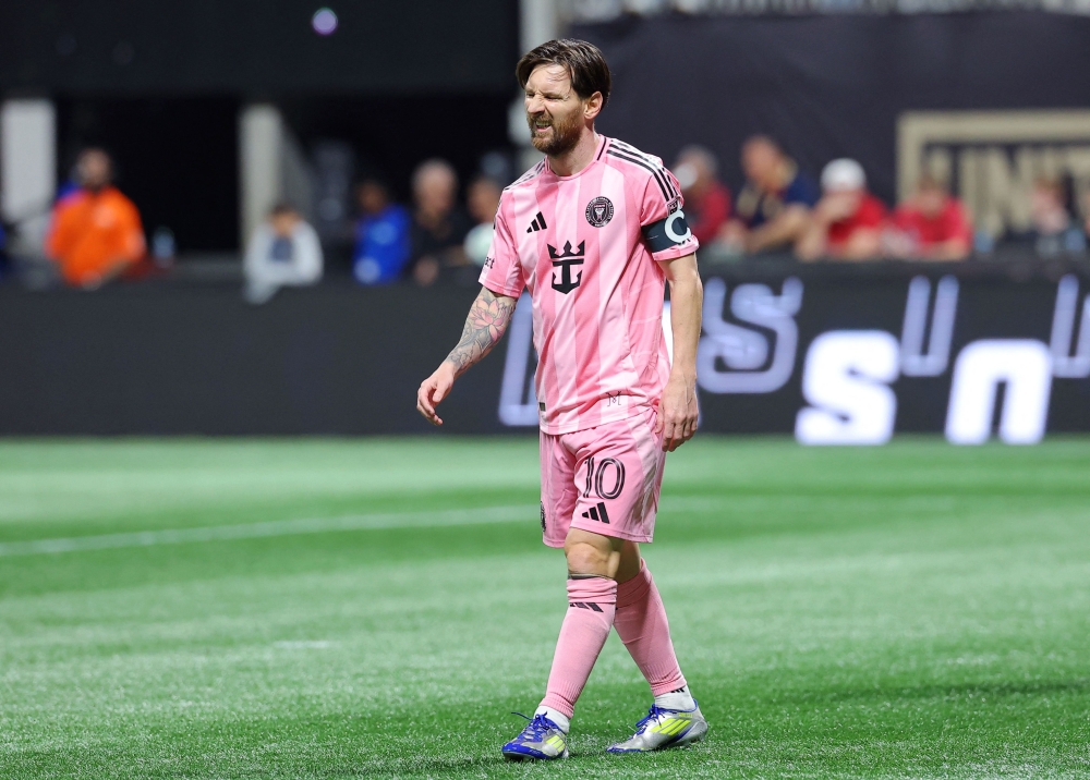 Lionel Messi #10 of Inter Miami CF reacts during the MLS match between Atlanta United and Inter Miami CF at Mercedes-Benz Stadium in Atlanta, Georgia, on March 16, 2025. (Photo by Kevin C Cox/Getty Images/AFP)
