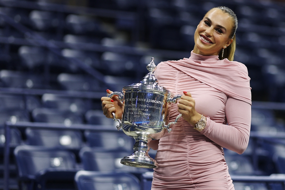 Aryna Sabalenka poses with the championship trophy after defeating Amanda Anisimova of the United States in the Queens borough of New York City. Sarah Stier/Getty Images/AFP