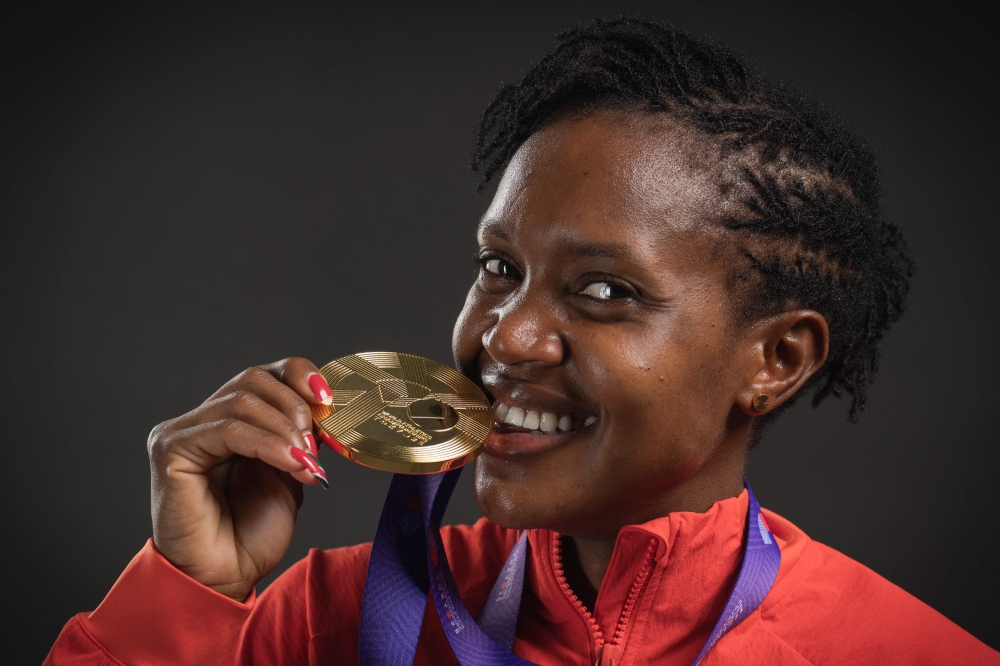 Gold medallist in the women's 1500m final Kenya's athlete Faith Kipyegon poses for portraits during a studio photo session on the sidelines of the World Athletics Championships in Tokyo on September 17, 2025. (Photo by Andrej Isakovic / AFP)