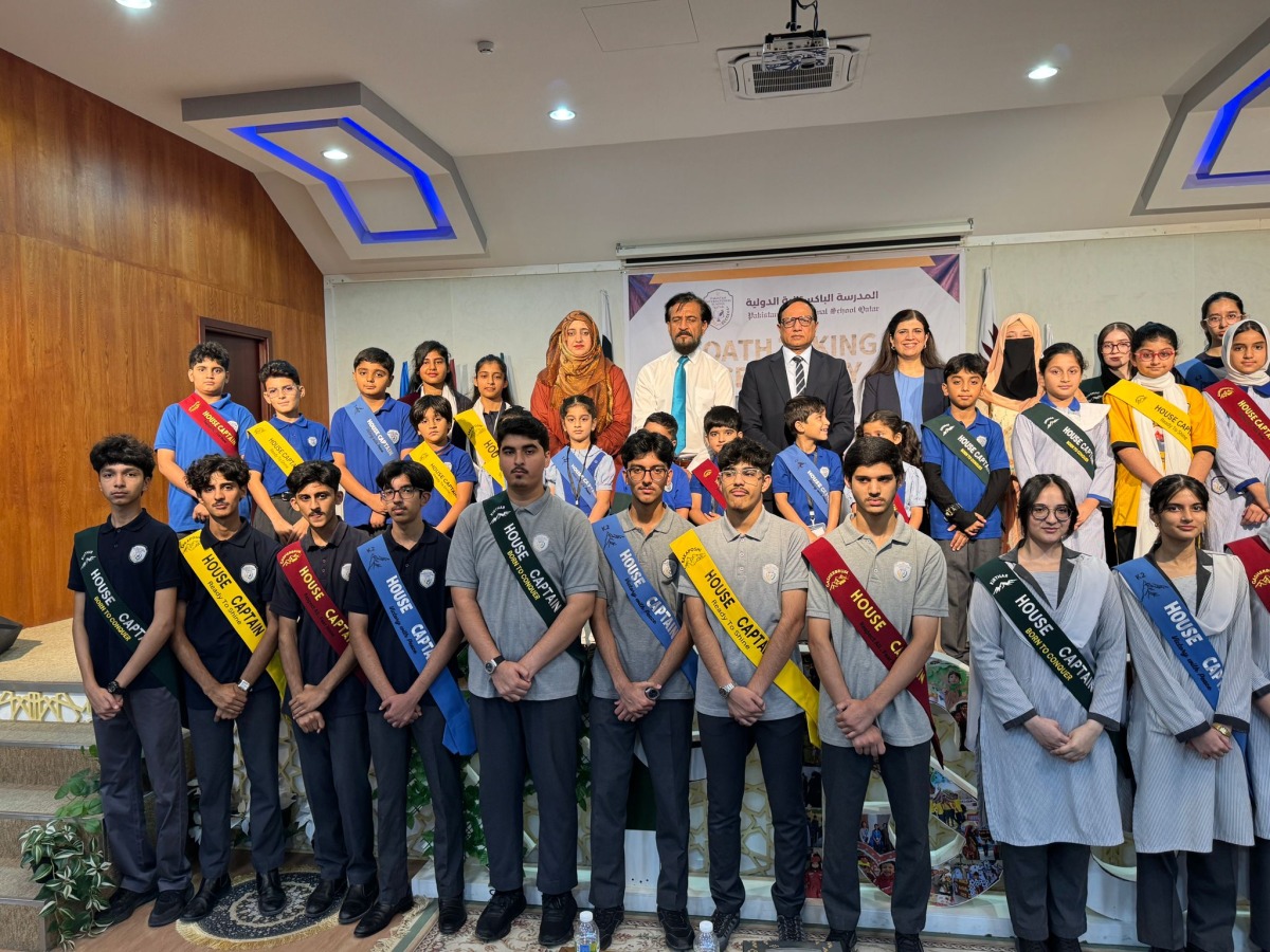 PISQ Principal Ch Muhammad Afzal with other officials and students during the event.