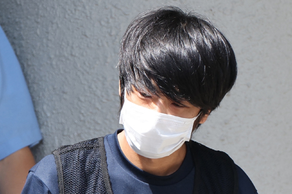 Tetsuya Yamagami, the man accused of murdering former Japanese Prime Minister Shinzo Abe,  in Nara on July 25, 2022. Photo by Jiji Press / AFP