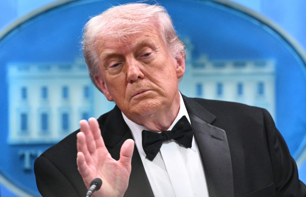 US President Donald Trump speaks during a press briefing in the Brady Briefing Room at the White House in Washington, DC, shortly after a shooting incident at the White House Correspondents’ Dinner on April 25, 2026. (Photo by Mandel Ngan / AFP)
 