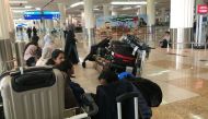 Picture: Dubai-flight-passengers-afp