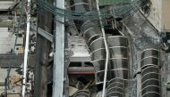 A derailed New Jersey Transit train is seen under a collapsed roof after it derailed and crashed into the station in Hoboken, New Jersey, U.S. September 29, 2016. (REUTERS/Carlo Allegri)
