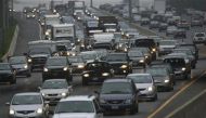 Morning commuter traffic moves slowly on the Washington Beltway, I-495, in Silver Spring, Maryland March 22, 2012. REUTERS/Gary Cameron