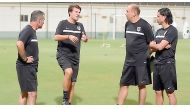 Al Rayyan’s new head coach Michael Laudrup (second left) speaks with supporting staff during a training session.