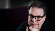 US novelist Douglas Kennedy poses for portraits on October 6, 2106 in Paris. / AFP / MARTIN BUREAU
