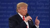 US Republican presidential candidate Donald Trump speaks during the second presidential debate at Washington University in St. Louis, Missouri, on October 9, 2016. / AFP / Robyn Beck