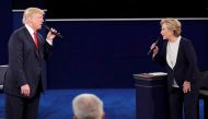 Republican U.S. presidential nominee Donald Trump and Democratic U.S. presidential nominee Hillary Clinton speak during their presidential town hall debate at Washington University in St. Louis, Missouri, U.S., October 9, 2016. Reuters/Jim Young 