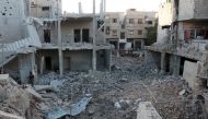 DAMASCUS, SYRIA - OCTOBER 10: Syrians inspect the remains of their houses after war crafts belonging to the Syrian army carried out an airstrike over residential areas at Arbin town of eastern Goutha in Damascus, Syria on October 10, 2016. ( Diaa Al Din -