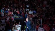 Republican presidential nominee Donald Trump arrives on stage during a rally at Mohegan Sun Arena in Wilkes-Barre, Pennsylvania on October 10, 2016. AFP / DOMINICK REUTER