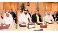 QC Vice-Chairman Mohamed bin Ahmed bin Tawar (second left) speaking at the event