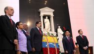 Venezuela's President Nicolas Maduro (C) attends a ceremony to sign off the 2017 national budget at the National Pantheon in Caracas, Venezuela October 14, 2016. Miraflores Palace/Handout via Reuters