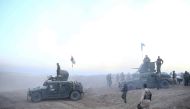 Peshmerga forces stand guard at Hazer region's Wardak village during an operation to retake Iraq's Mosul from Deash in Iraq on October 17, 2016. A much anticipated Mosul offensive to liberate the city from Daesh began midnight Sunday, according to Iraqi P