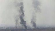 Smoke rises from clashes at Bartila in the east of Mosul during clashes with Islamic State militants, Iraq, October 18, 2016. REUTERS/Thaier Al-Sudani