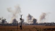 Smoke rises after strikes on Syria Democratic Forces (SDF) controlled Tell Rifaat town, northern Aleppo province, Syria. Reuters/Khalil Ashawi